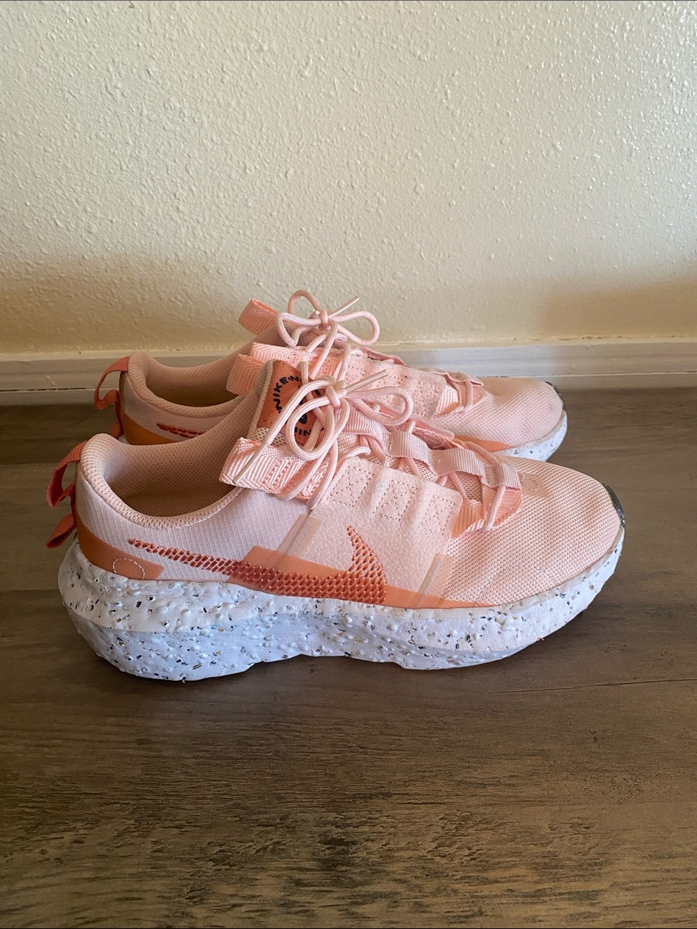 Nike Women's Peach-Pink Running Sneakers with Speckled White Sole
